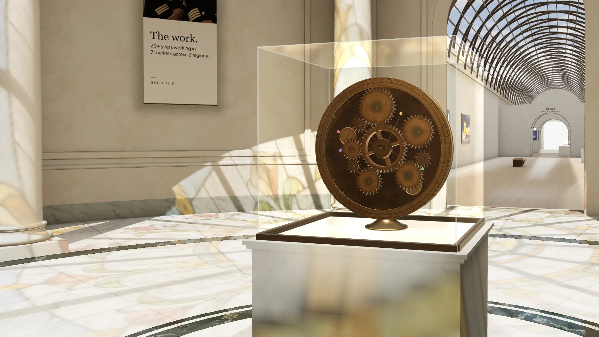 The rotunda: a round hall under a stained-glass dome, with a bronze gear mechanism in a glass vitrine at its centre
